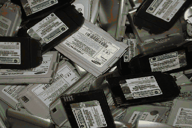 Pictures of cell phones, boards and batteries for recycling